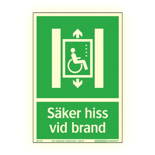 Skylt säker hiss vid brand Supernova färgefterlysande